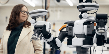 Professor of AI and ethics Shannon Vallor meets a robot at the Bayes Centre