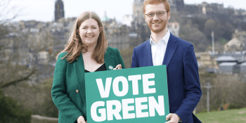 Gillian Mackay and Ross Greer with placard