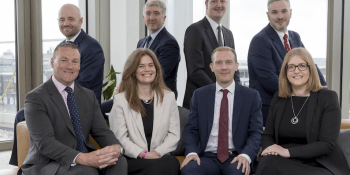 Jonathan Lee, front left, with Stephen Goldie, back row second left and new partners