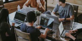 workers on laptops