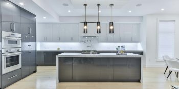 modern grey kitchen with mood lighting and island