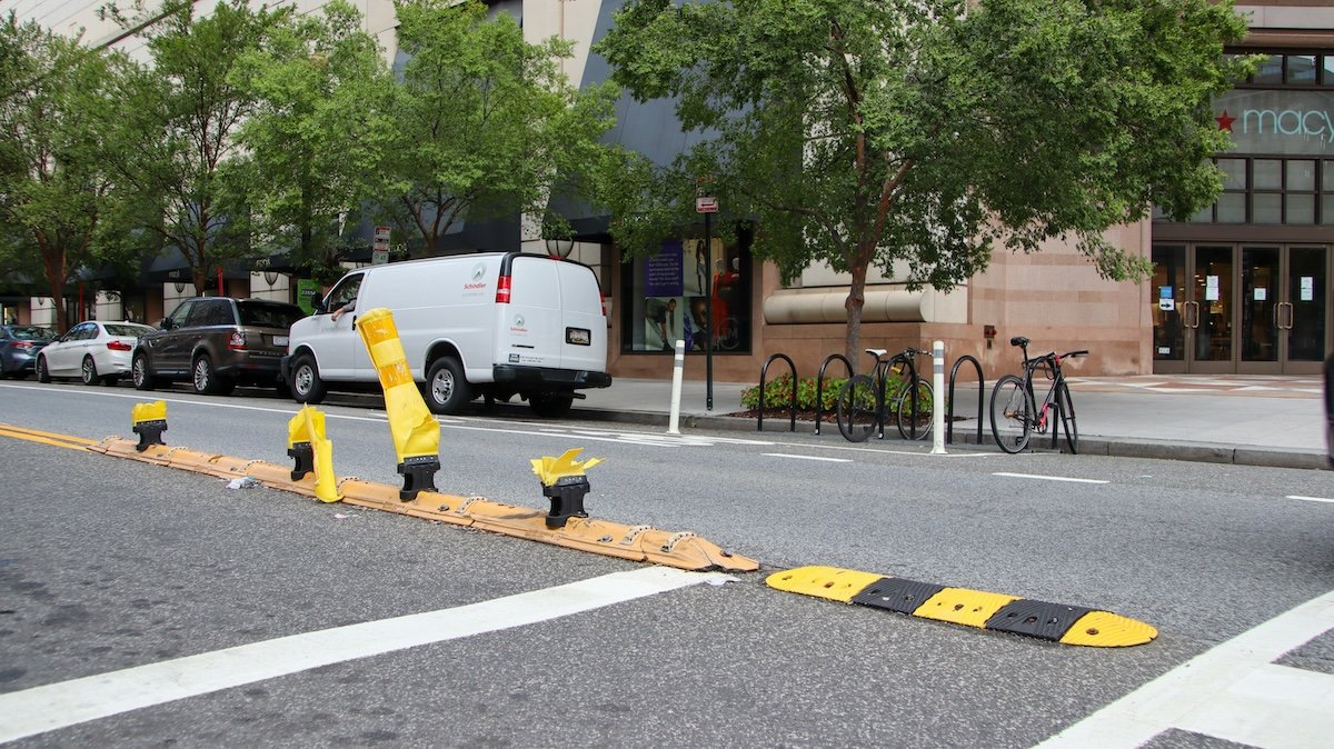 road with yellow markers on it